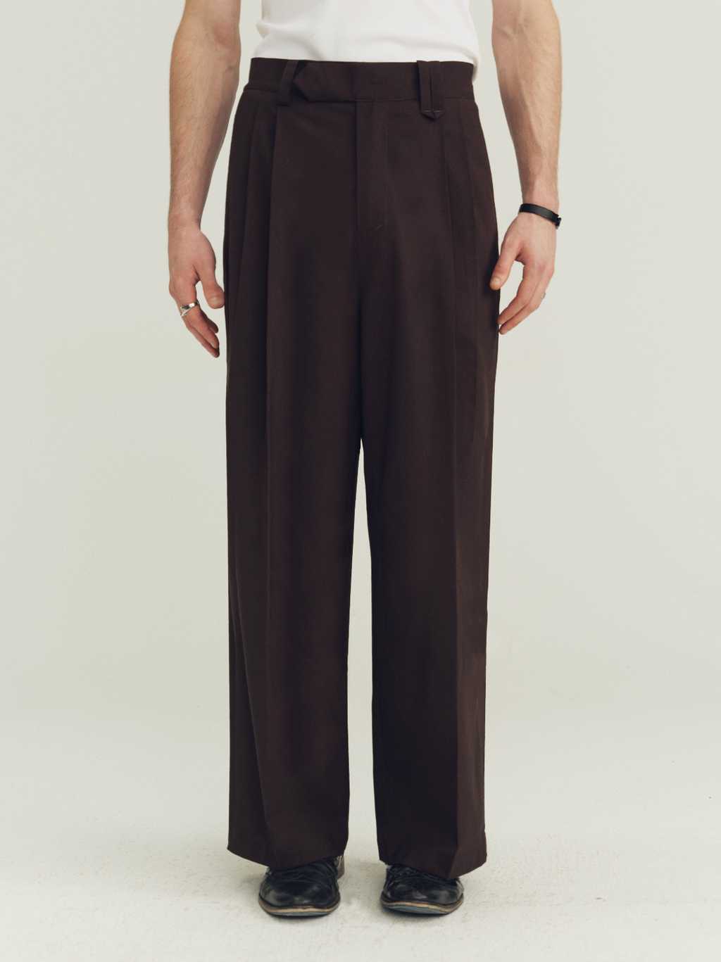 THE PROUDER classic-fit slightly loose pleated wool trousers